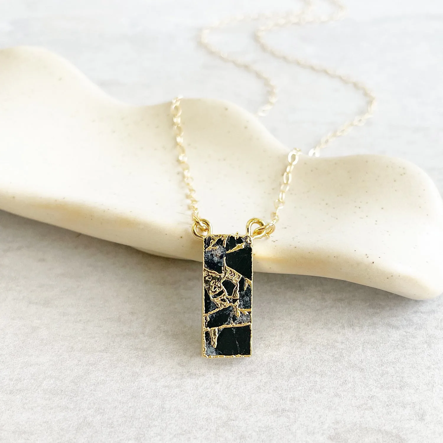 Black Mojave Bar Necklace in Gold. Simple Gold Layering Necklace