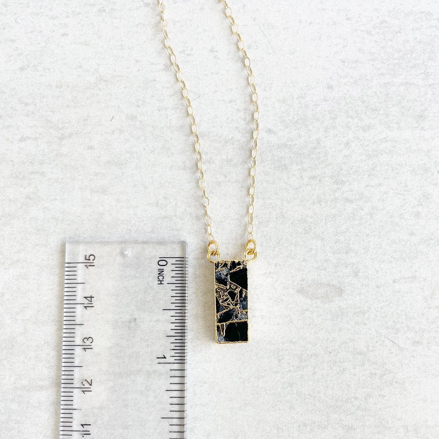 Black Mojave Bar Necklace in Gold. Simple Gold Layering Necklace